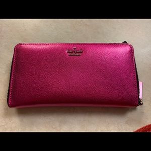 Metalic pink Kate Spade zip around wallet